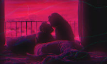 couple canoodling in bed