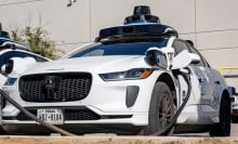 A Waymo EV charges up.