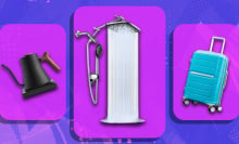 electric kettle, shower head, and luggage on abstract wintery background