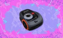 the Segway Navimow i110N on a purple background