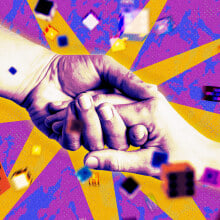 Hands shaking surrounding by dice
