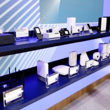 Several modems and routers equipped with 5G technology are exhibited at Qualcomm's pavilion