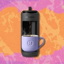 keurig k-mini mate coffee maker against a pink and orange patterned background