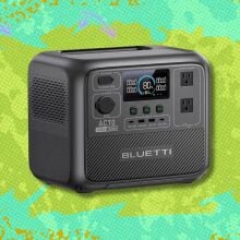 bluetti ac70 portable power station against a green patterned background