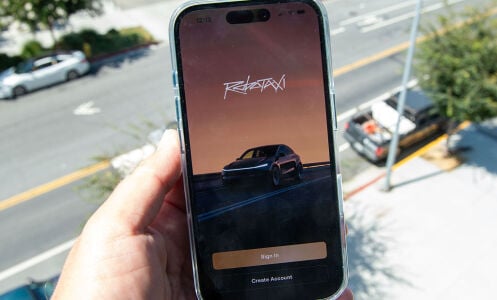 Tesla Robotaxi app on phone screen