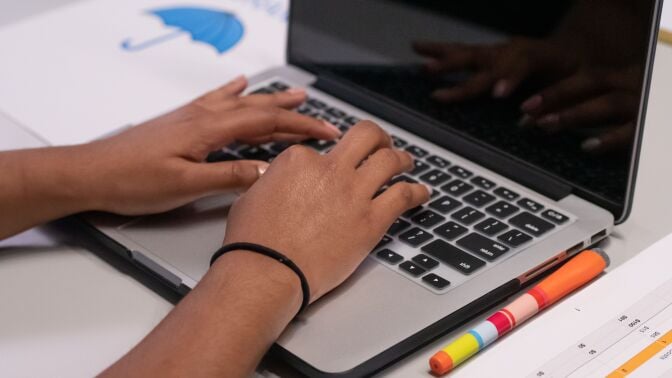 Hands on laptop