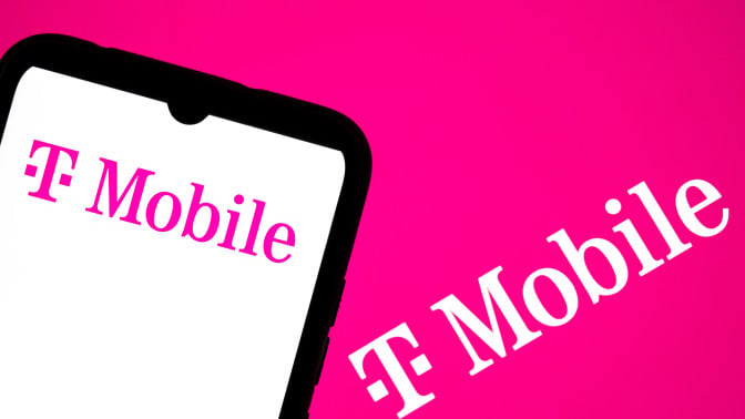 T-Mobile logo appears on a smartphone screen and as the background on a laptop computer screen